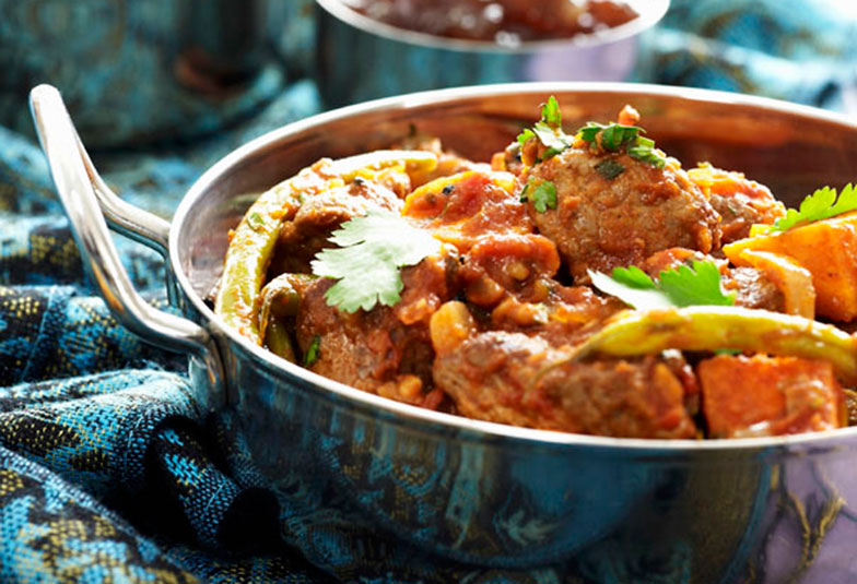 Die neue Curry-Kreation wird in einer Art Wok, dem Balti, zubereitet. Bild: bab.ch/StockFood